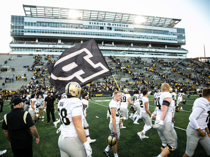 Purdue players celebrate their win at Iowa